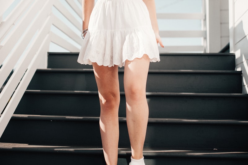 A person standing in a full-length outfit, showing the overall silhouette.