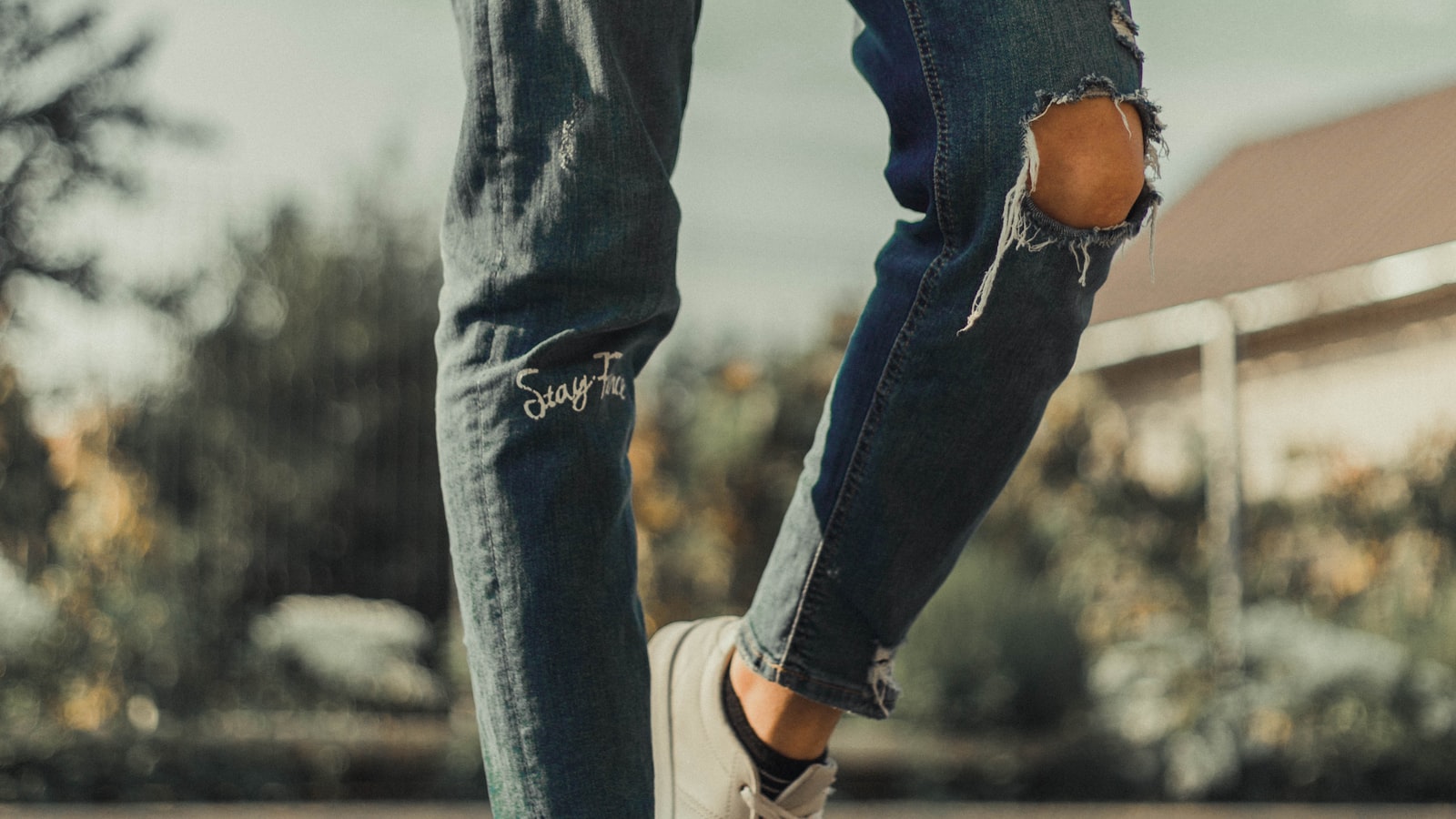 A stack of folded blue denim jeans.