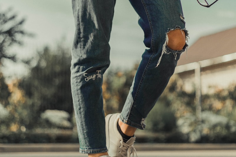 A stack of folded blue denim jeans.